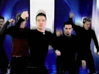 Chris is obviously too busy looking all intense to be bothered with the actual choreography here.