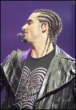 I know, I know--cornrows.  But you can think of him as pure e-ville if that helps!